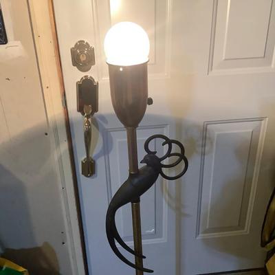 Sale Photo Thumbnail #50: This is a great floor lamp that is brass with an Art Nuevo bird that is black and a bass painted black.  It works.