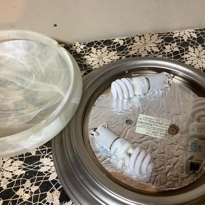 Sale Photo Thumbnail #82: This is a silver modern ceiling light with frosted shade.