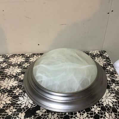 Sale Photo Thumbnail #80: This is a silver modern ceiling light with frosted shade.