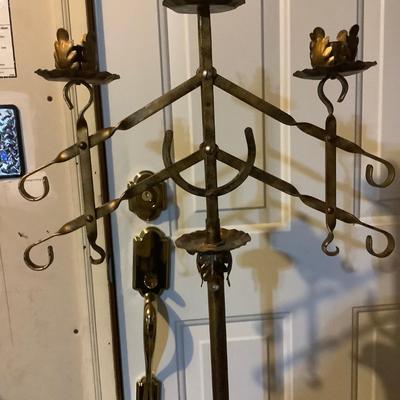 Sale Photo Thumbnail #102: This is a great vintage metal candelabra.
