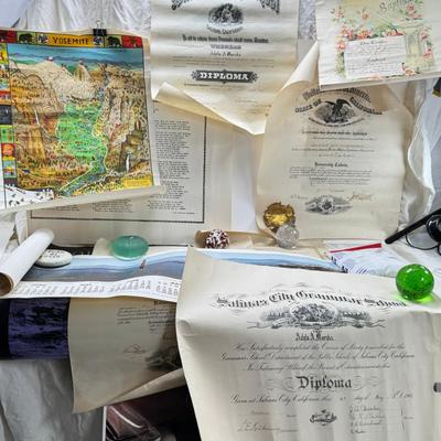 Sale Photo Thumbnail #198: Paperweights are NOT included in the lot. You are bidding on rolled 1977 Calendar, Movie poster, Yosemite vintage 1931 map, Navy poem. Vintage ephemera. Apollo 11 25th anniversary posters. A lot of the paper dates from 1900s, and as such as wear , it also