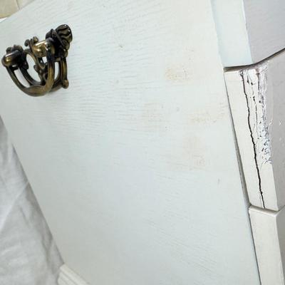 Sale Photo Thumbnail #227: Thomas Pacomi designer, 15X11 with 4 drawers and a lift off lid. Very heavy , with hand painted floral design in good condition. The drawers are divided for all kinds of jewelry. There is one repair photoed, to the edge of one of the drawers.