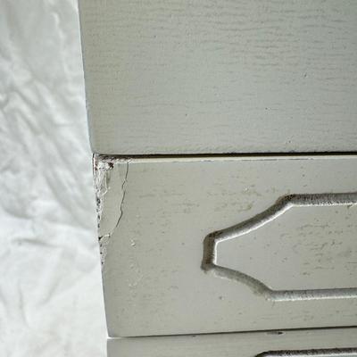 Sale Photo Thumbnail #231: Thomas Pacomi designer, 15X11 with 4 drawers and a lift off lid. Very heavy , with hand painted floral design in good condition. The drawers are divided for all kinds of jewelry. There is one repair photoed, to the edge of one of the drawers.