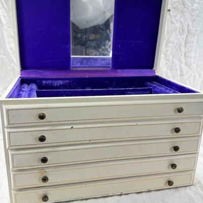 Sale Photo Thumbnail #238: Lined with purple material this "leatherette" box has divided drawers and is in good condition except for one small nick to one of the drawer fronts and a few areas of discoloration which I have not tried to clean. Measures 10X10X9"