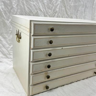 Sale Photo Thumbnail #245: Lined with purple material this "leatherette" box has divided drawers and is in good condition except for one small nick to one of the drawer fronts and a few areas of discoloration which I have not tried to clean. Measures 10X10X9"