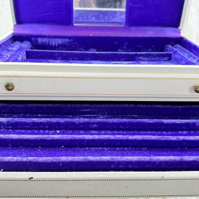 Sale Photo Thumbnail #239: Lined with purple material this "leatherette" box has divided drawers and is in good condition except for one small nick to one of the drawer fronts and a few areas of discoloration which I have not tried to clean. Measures 10X10X9"