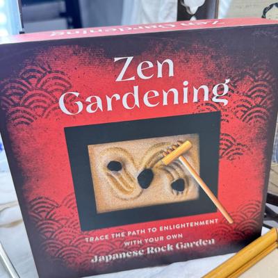 Sale Photo Thumbnail #257: 2 matching bamboo framed prints. 1 geisha theme print in a carved from. The vase is metal inside and quite heavy. New unopened Zen garden