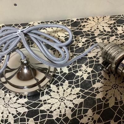 Sale Photo Thumbnail #118: This is a new hanging light fixture. It is the fixture ceiling fastener, cord and light bulb holder.