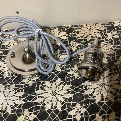 Sale Photo Thumbnail #115: This is a new hanging light fixture. It is the fixture ceiling fastener, cord and light bulb holder.