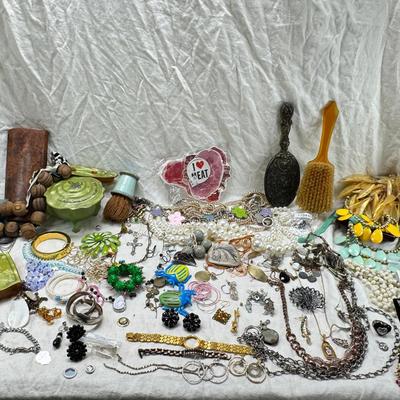 Sale Photo Thumbnail #295: Victorian vanity items, mirror, celluloid brush, shaving brush, early plastic containers. Beads, chains, Jewelry, necklaces, pins, bracelets, there are some strands that might need repair, there is a bag of extra beads, single earrings and of course a bag