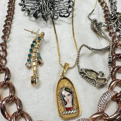 Sale Photo Thumbnail #307: Victorian vanity items, mirror, celluloid brush, shaving brush, early plastic containers. Beads, chains, Jewelry, necklaces, pins, bracelets, there are some strands that might need repair, there is a bag of extra beads, single earrings and of course a bag