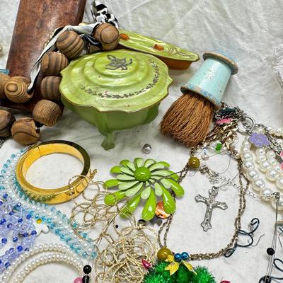 Sale Photo Thumbnail #309: Victorian vanity items, mirror, celluloid brush, shaving brush, early plastic containers. Beads, chains, Jewelry, necklaces, pins, bracelets, there are some strands that might need repair, there is a bag of extra beads, single earrings and of course a bag