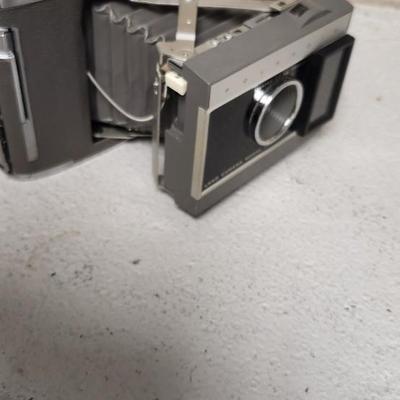 Sale Photo Thumbnail #54: Polaroid J66 in hard case with flash attachment...still has film in it. Fit in larger one rate box