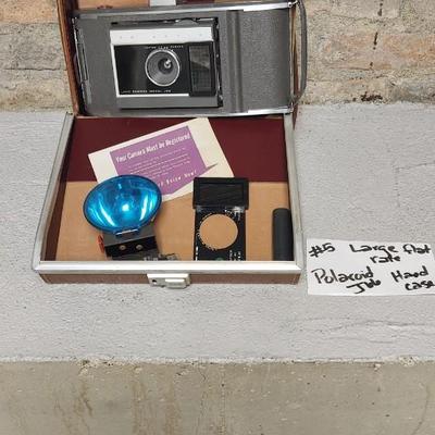 Sale Photo Thumbnail #46: Polaroid J66 in hard case with flash attachment...still has film in it. Fit in larger one rate box