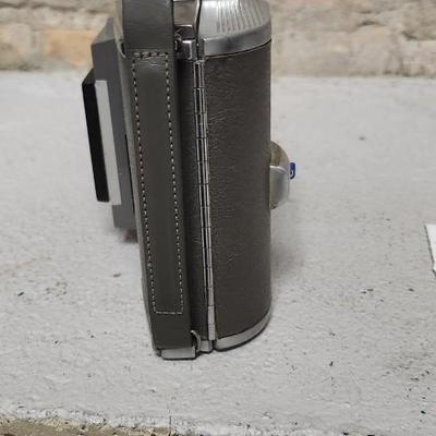 Sale Photo Thumbnail #51: Polaroid J66 in hard case with flash attachment...still has film in it. Fit in larger one rate box