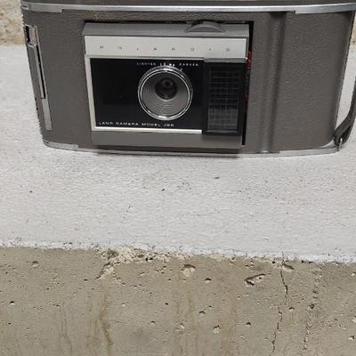 Sale Photo Thumbnail #50: Polaroid J66 in hard case with flash attachment...still has film in it. Fit in larger one rate box