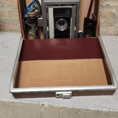 Sale Photo Thumbnail #57: Polaroid J66 in hard case with flash attachment...still has film in it. Fit in larger one rate box