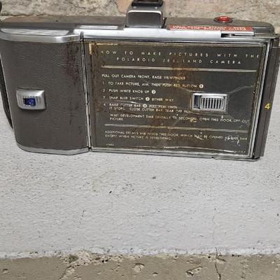 Sale Photo Thumbnail #52: Polaroid J66 in hard case with flash attachment...still has film in it. Fit in larger one rate box