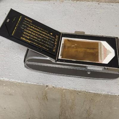 Sale Photo Thumbnail #55: Polaroid J66 in hard case with flash attachment...still has film in it. Fit in larger one rate box