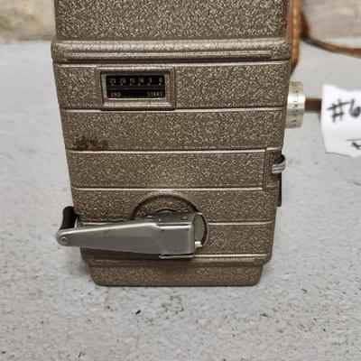 Sale Photo Thumbnail #61: Metal Bell and Howell one nine camera in case with light attachment. Fit a medium flat rate box