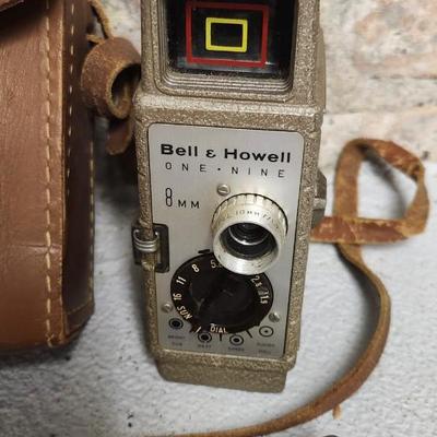Sale Photo Thumbnail #60: Metal Bell and Howell one nine camera in case with light attachment. Fit a medium flat rate box