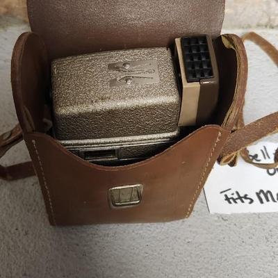 Sale Photo Thumbnail #70: Metal Bell and Howell one nine camera in case with light attachment. Fit a medium flat rate box