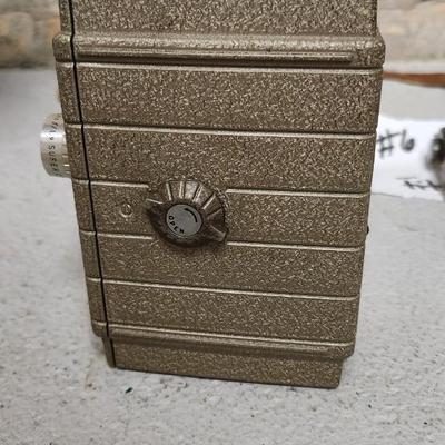 Sale Photo Thumbnail #63: Metal Bell and Howell one nine camera in case with light attachment. Fit a medium flat rate box