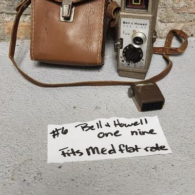 Sale Photo Thumbnail #59: Metal Bell and Howell one nine camera in case with light attachment. Fit a medium flat rate box