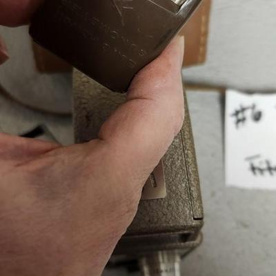 Sale Photo Thumbnail #69: Metal Bell and Howell one nine camera in case with light attachment. Fit a medium flat rate box