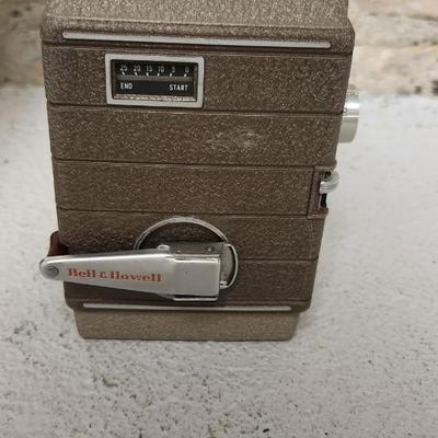 Sale Photo Thumbnail #78: Bell and Howell metal 252 in leather case. Fits medium flat rate box