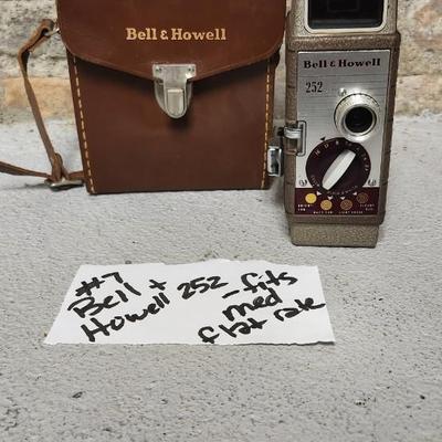 Sale Photo Thumbnail #74: Bell and Howell metal 252 in leather case. Fits medium flat rate box