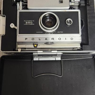 Sale Photo Thumbnail #102: Polaroid 250 in case. Fits large flat rate box