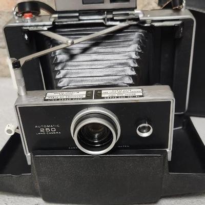 Sale Photo Thumbnail #97: Polaroid 250 in case. Fits large flat rate box