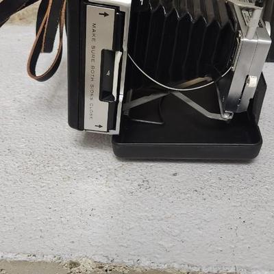 Sale Photo Thumbnail #98: Polaroid 250 in case. Fits large flat rate box