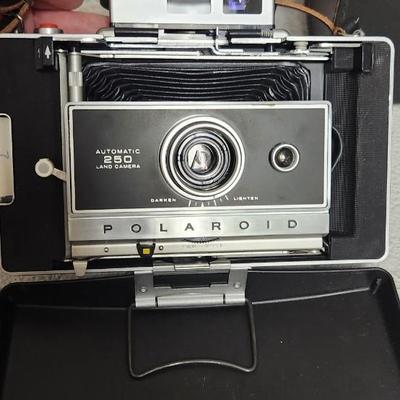 Sale Photo Thumbnail #101: Polaroid 250 in case. Fits large flat rate box