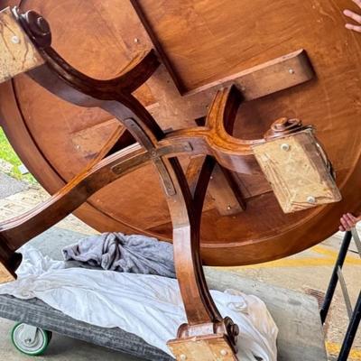Sale Photo Thumbnail #16: Late 20th C Therien Studio Workshop French Provincial (1700-1800) Volute Round Stained Walnut Wood Dining Table.
Approximate Size 64" x 28"
“In great overall condition. Center marks and one large scratch mark on the top. General marks, nicks, scratches 