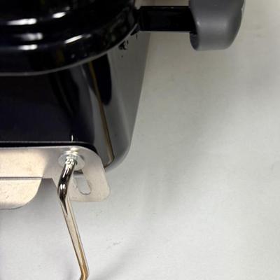 Sale Photo Thumbnail #402: This compact and lightweight grill is designed for easy transport and is suitable for camping, tailgating, and small outdoor spaces. Used, but in very clean, near-new condition.