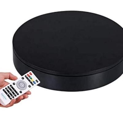 Sale Photo Thumbnail #407: Tested, turntable works on manual mode and with remote. Approx. 12.6" (32cm) across, 2.4" 6cm) high. Can be used as a photography stand or as a display stand.