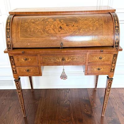 Sale Photo Thumbnail #18: 20th Century Antique Italian Walnut Rosewood & Marquetry Cylinder Bureau Writing Desk. Decorated borders, the fall with oval figural roundel and enclosing a fitted interior with sliding writing surface and 4 drawers. 5 drawers about the arched kneehole wi