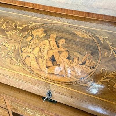 Sale Photo Thumbnail #22: 20th Century Antique Italian Walnut Rosewood & Marquetry Cylinder Bureau Writing Desk. Decorated borders, the fall with oval figural roundel and enclosing a fitted interior with sliding writing surface and 4 drawers. 5 drawers about the arched kneehole wi