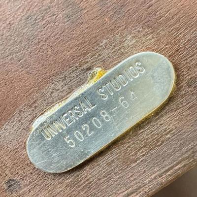 Sale Photo Thumbnail #33: Antique Universal Studios (marked with a tag) large executive, partner or director's desk most likely used on set as a prop. Has "dummy" set of drawers on one side (they don't open). Comes with key. Black Leather Top. Comes apart into 3 - Pieces (2 drawer