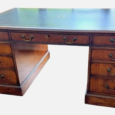 Sale Photo Thumbnail #28: Antique Universal Studios (marked with a tag) large executive, partner or director's desk most likely used on set as a prop. Has "dummy" set of drawers on one side (they don't open). Comes with key. Black Leather Top. Comes apart into 3 - Pieces (2 drawer