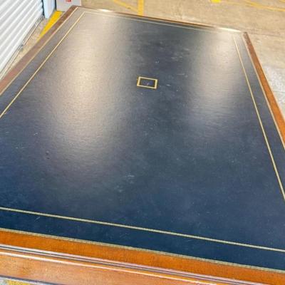Sale Photo Thumbnail #29: Antique Universal Studios (marked with a tag) large executive, partner or director's desk most likely used on set as a prop. Has "dummy" set of drawers on one side (they don't open). Comes with key. Black Leather Top. Comes apart into 3 - Pieces (2 drawer
