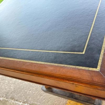 Sale Photo Thumbnail #30: Antique Universal Studios (marked with a tag) large executive, partner or director's desk most likely used on set as a prop. Has "dummy" set of drawers on one side (they don't open). Comes with key. Black Leather Top. Comes apart into 3 - Pieces (2 drawer