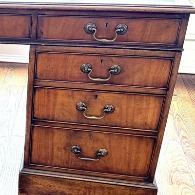 Sale Photo Thumbnail #32: Antique Universal Studios (marked with a tag) large executive, partner or director's desk most likely used on set as a prop. Has "dummy" set of drawers on one side (they don't open). Comes with key. Black Leather Top. Comes apart into 3 - Pieces (2 drawer