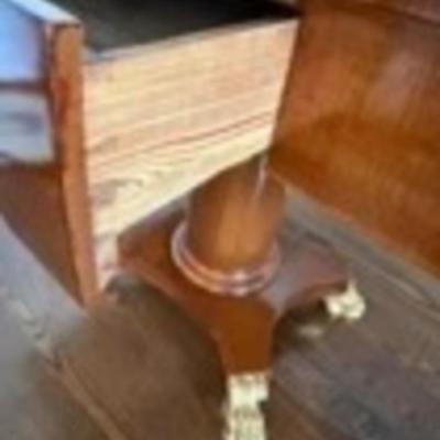 Sale Photo Thumbnail #39: Antique Early 20th Century (1920's ) Swedish Karl-Johan Biedermeier Style Extendable Drop Leaf Mahogany Wood Salon Table on Column Base w Gold Claw Feet (one was repaired)
Approximate Size 34" x 27" x 29.5"

“In good condition consistent with age. Gener