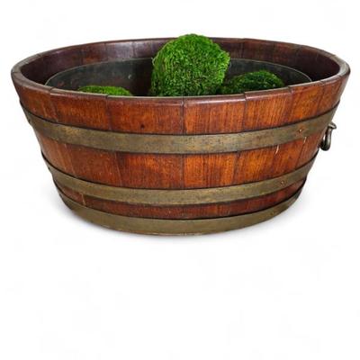 Sale Photo Thumbnail #31: Georgian brass bound barrell form cellarette