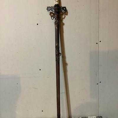 Sale Photo Thumbnail #211: This is a great religious sword with etched s blade and cross.