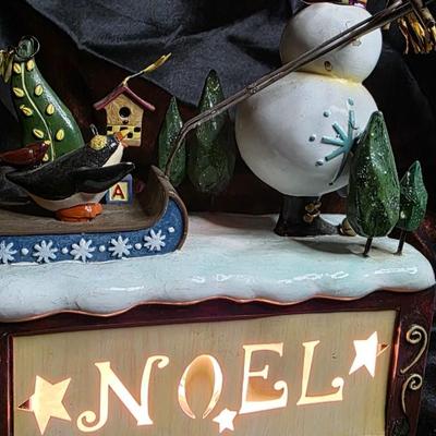 Vintage Lighted Snowman Skiing with Penguin Holiday Figurine - Illuminated "NOEL" Christmas Scene
