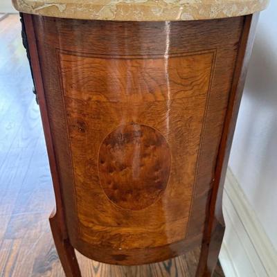 Sale Photo Thumbnail #57: Pair of Antique Marble Top Ormolu French Louis XV Nightstands or Accent Tables  23.5" x 16" x 34"
“Antique condition with some marks and dings in the wood. One area on the front looks like maybe it was repaired.